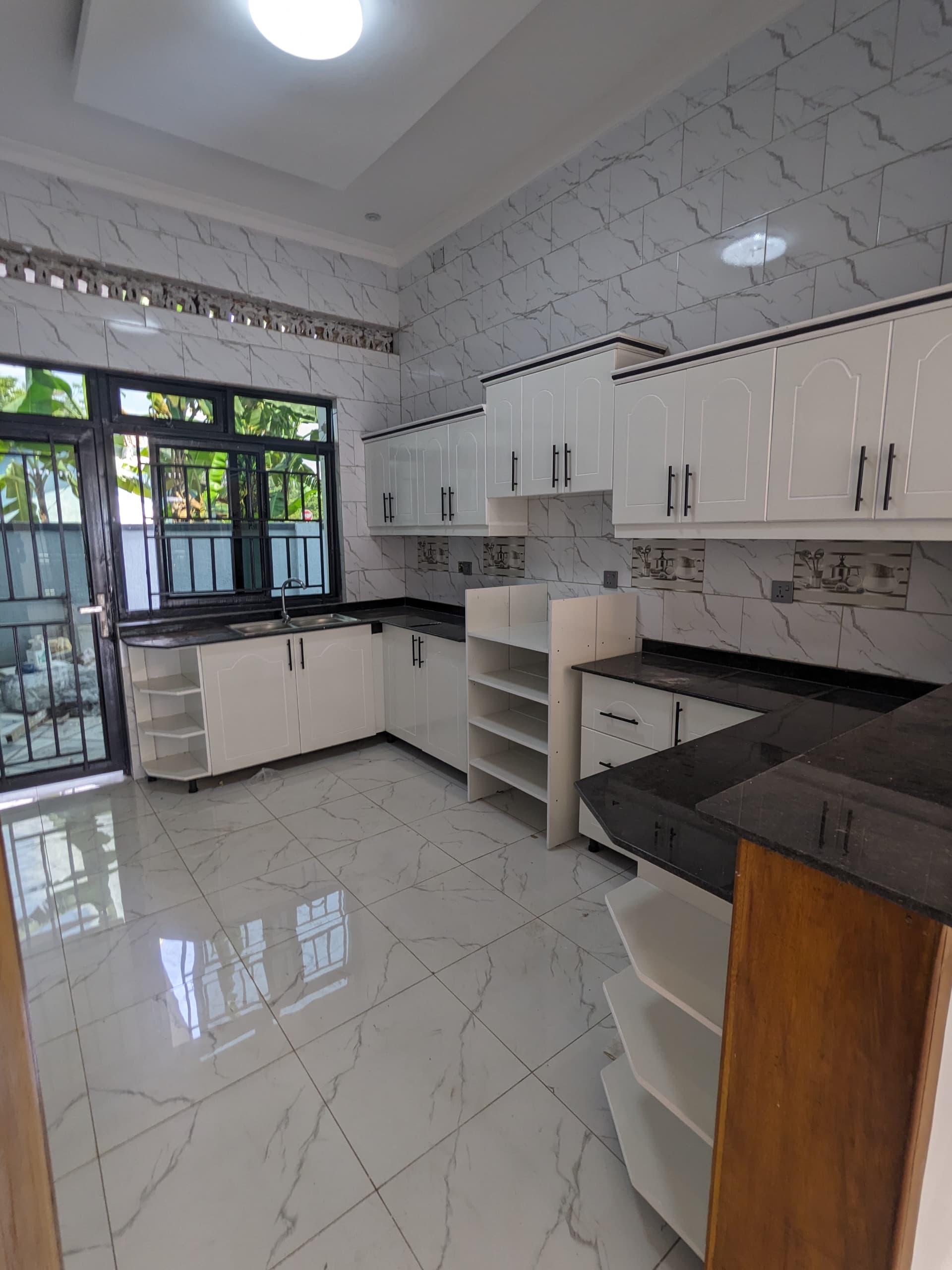 NEW BUILDING FOR SALE TWO HOUSES IN ONE IN KIGALI