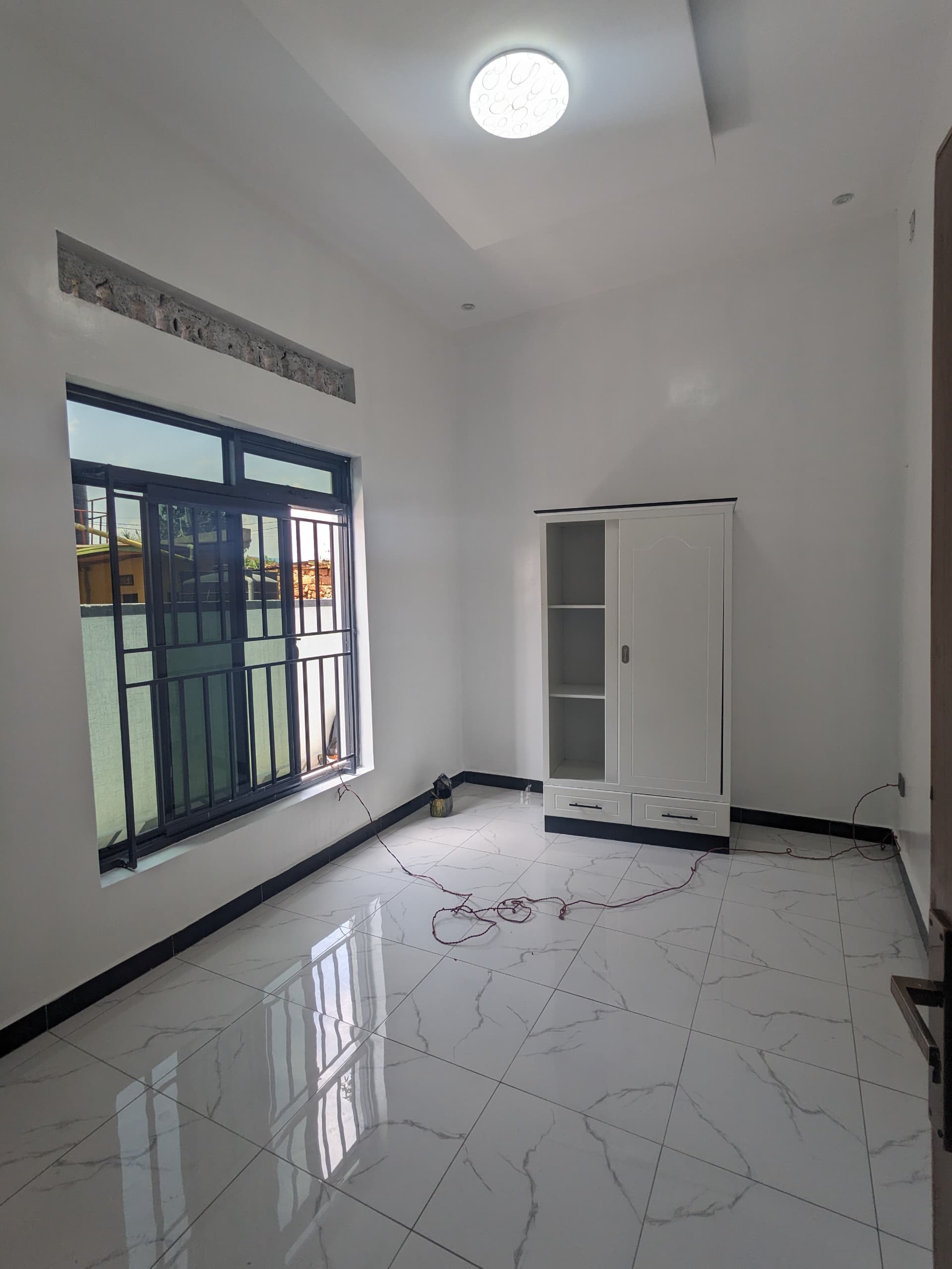 NEW BUILDING FOR SALE TWO HOUSES IN ONE IN KIGALI